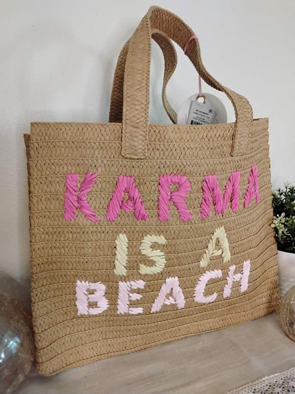 KARMA Is A Beach Embroidered Straw Tote in Pink & Cream